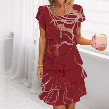 Elegant damekjole med flæser