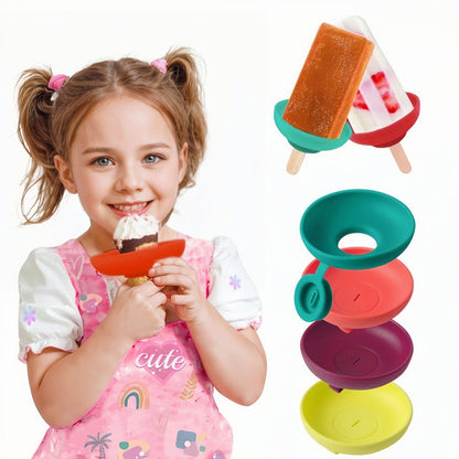 🍦 50 % RABAT! 4-PAK Dråbefri silikoneholder til ispinde og softis – perfekt til børn! 💧 Opfanger hver eneste dråbe, holder børnene og tøjet rent – BPA-fri og tåler opvaskemaskine. 🎨 Sjove farver